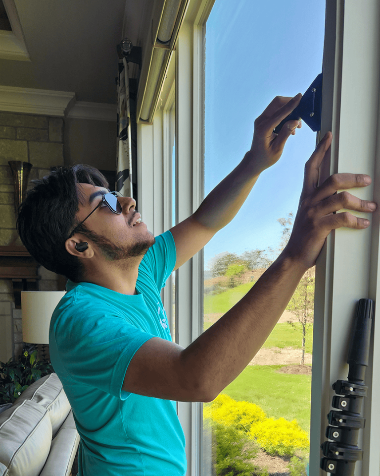 professional window cleaner making Omaha window shine